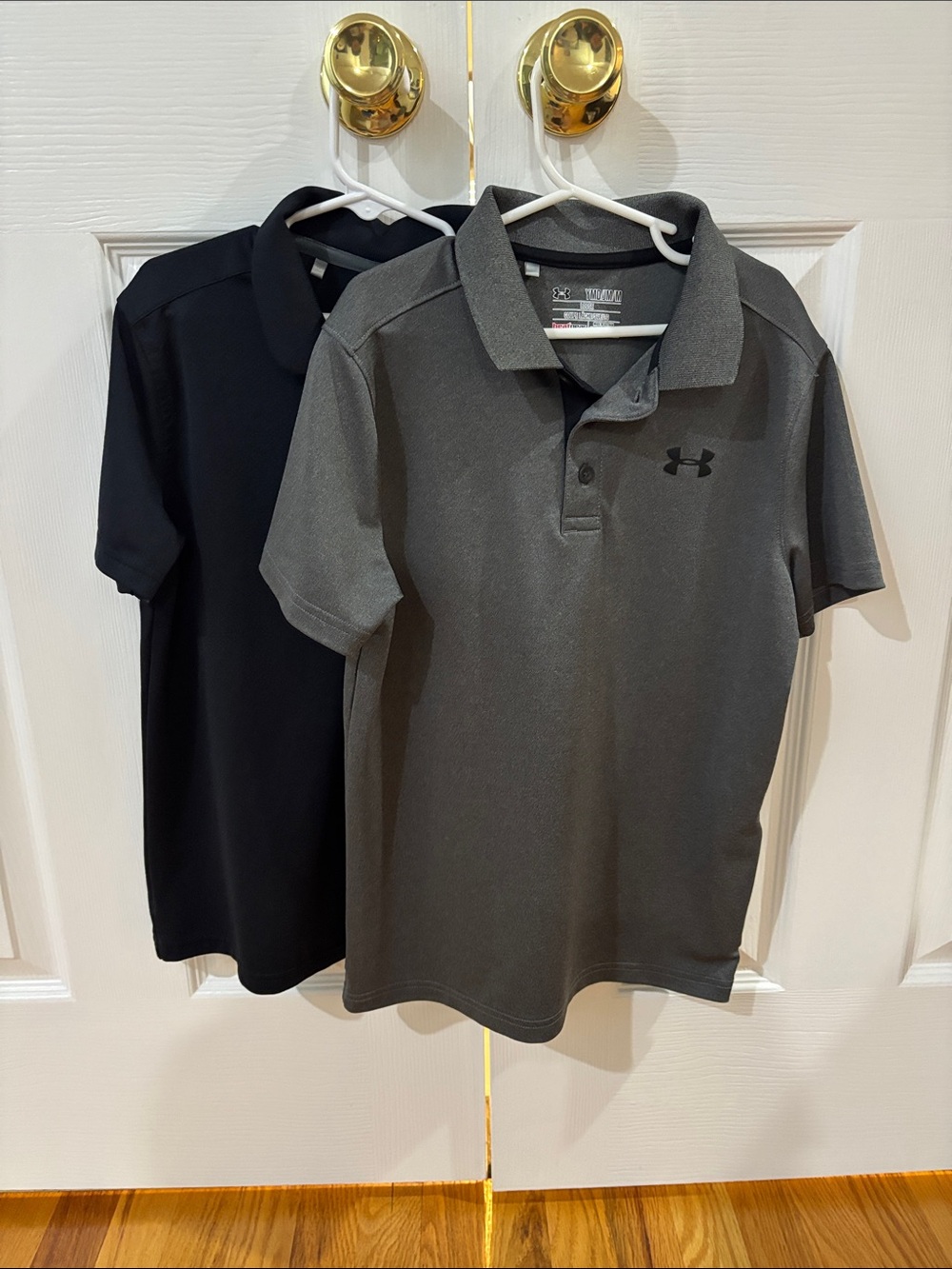 2 Under Armour boys Polo Shirts